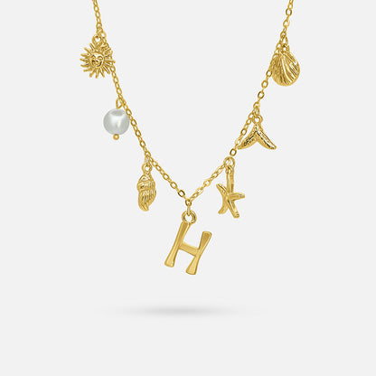 GOLD OCEAN LETTER NECKLACE ( A - Z)