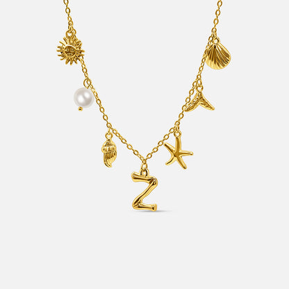 GOLD OCEAN LETTER NECKLACE ( A - Z)